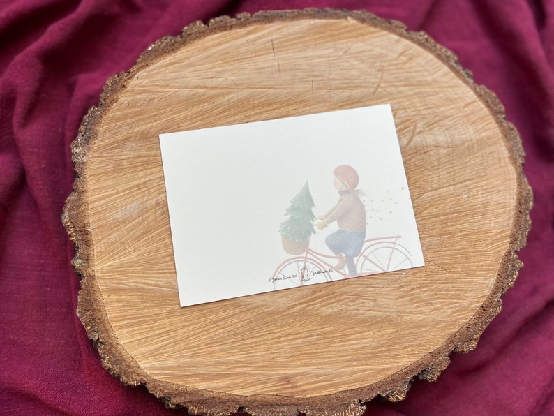 Postkarte „Dezembergefühle“ | eine besondere, liebevoll illustrierte Karte für alle, die Winter, Weihnachtsbäume und Fahrräder lieben.