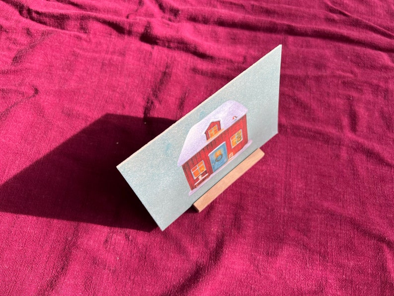 Postkarte "Weihnachtshaus" | Eine wunderschöne Illustration vom winterlichen Ruheort.