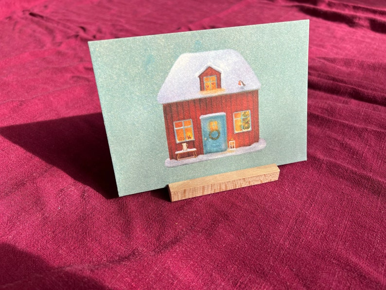 Postkarte "Weihnachtshaus" | Eine wunderschöne Illustration vom winterlichen Ruheort.