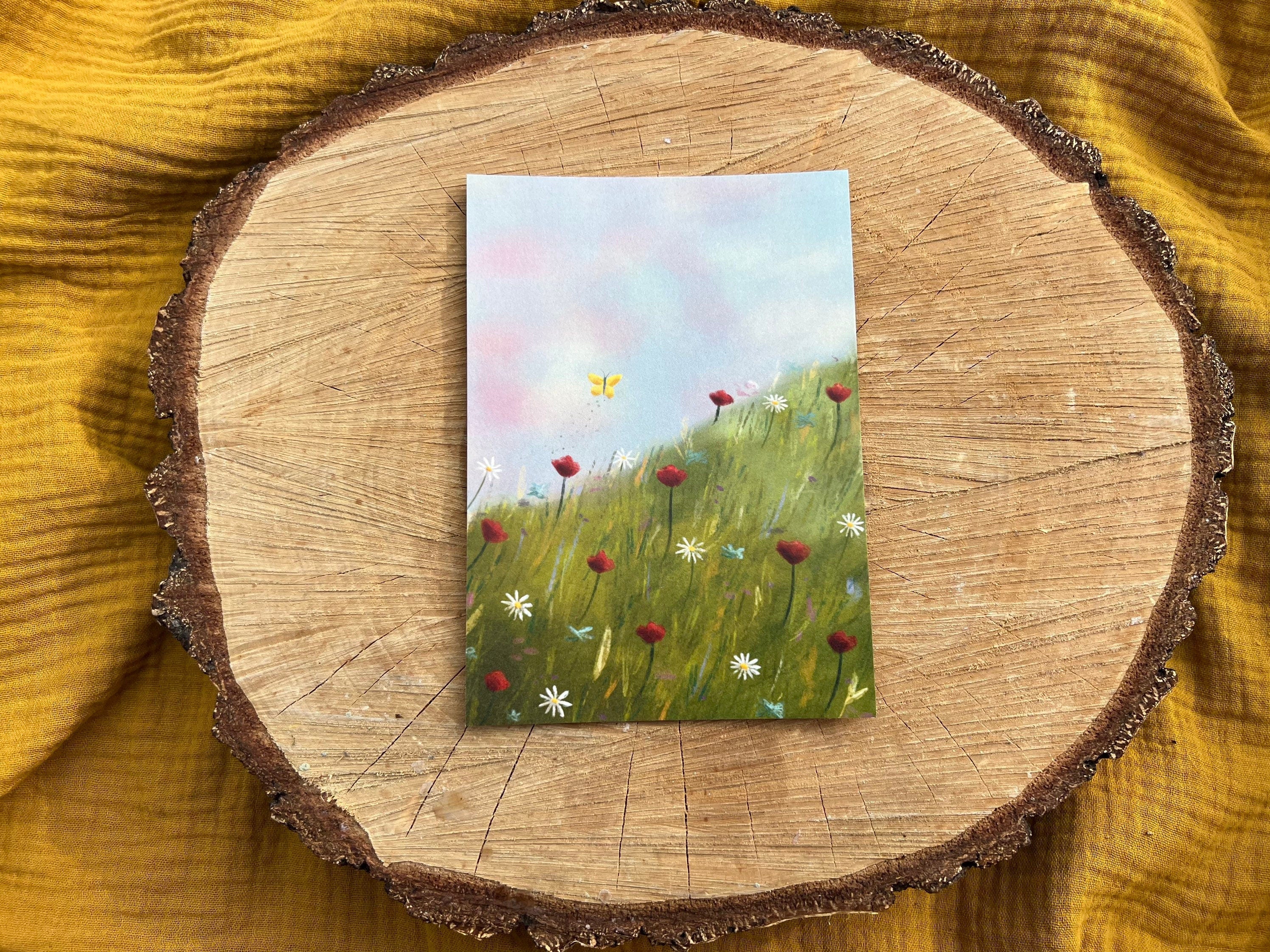 Postkarte „Schmetterlingsflug“ | ein Motiv mit Blumenwiese, das zum Träumen und Erzählen einlädt.